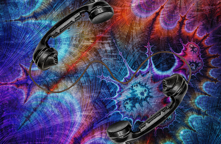 Two rotary phone handsets attached together with a cord on a psychedelic background.