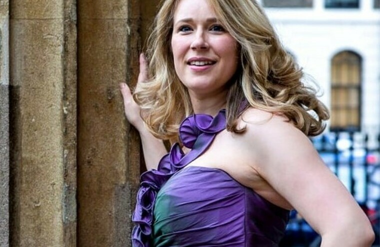 Jocelyn Freeman photographed in front of an old building