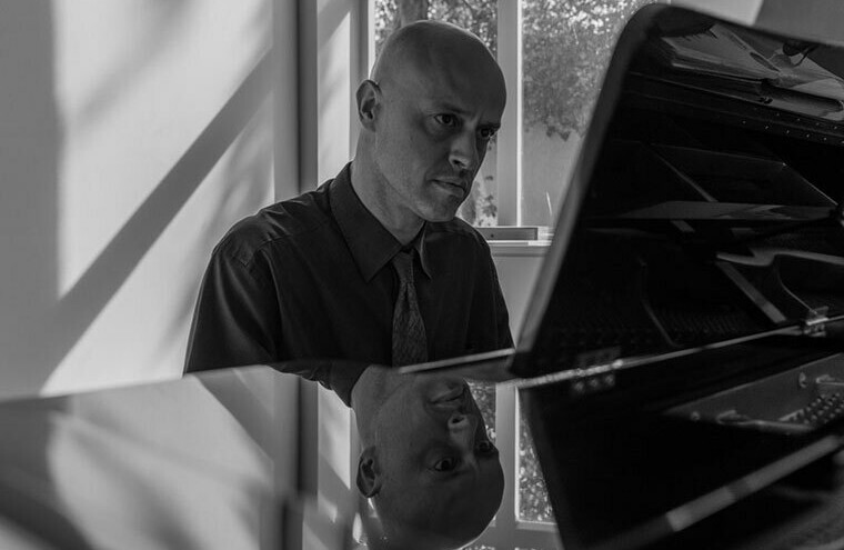 A player seated at a piano